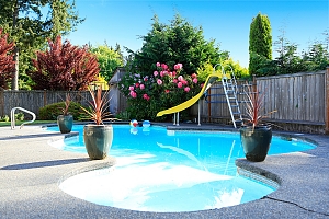 backyard vinyl pool with slide