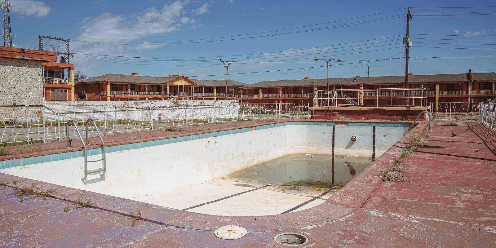 abandoned outdoor swimming pool at a motel